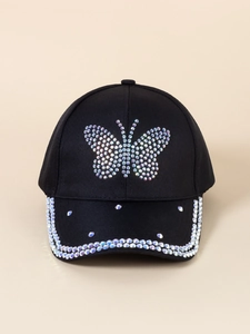Detailed close-up of a black baseball cap featuring sparkling butterfly rhinestone patterns
