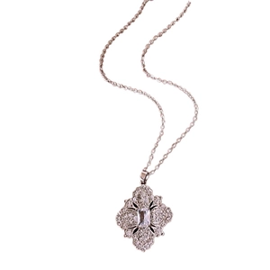 Silver vintage necklace featuring a zircon flower pendant on a white background