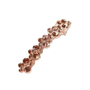 Rose gold hair clip with champagne rhinestones in a wave pattern on a white background