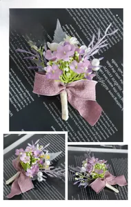 Detail of lavender boutonniere with silk ribbon, faux pearls and artificial flowers