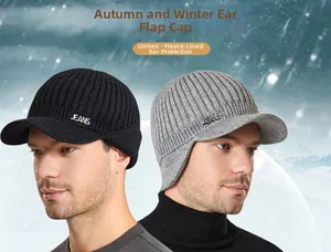 Close-up of knit winter hat with fleece lining and metal logo for ear protection