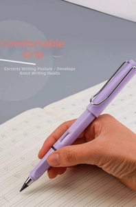 Purple ergonomic inkless pencil with metal clip being used for writing on a notebook