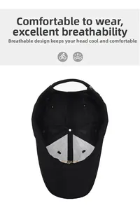 Detail view showing breathable mesh lining and adjustable strap of the black baseball cap