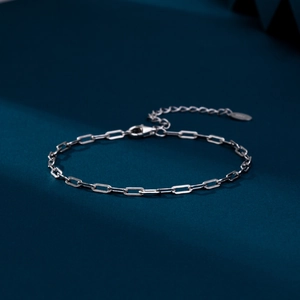 Close-up of S925 sterling silver paperclip link bracelet with lobster clasp and extender