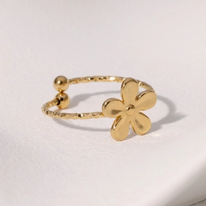Minimalist gold plated stainless steel flower ring with adjustable open band and textured finish