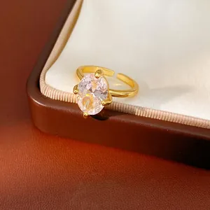 Elegant 18k gold plated open ring featuring a large oval cubic zirconia centerpiece