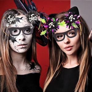 Detail of Halloween costume accessories including skull headband and glittery party glasses
