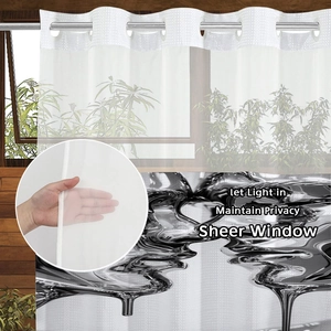 Semi-sheer bathroom curtain with metal eyelets showing light filtering and privacy detail