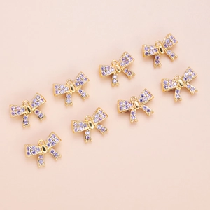 18K gold plated bow pendants with purple zircon stones for DIY jewelry making