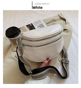 Detailed close-up of white semi-circle waist bag with stylish striped wide strap