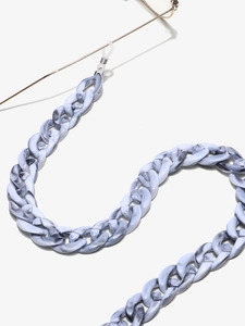 Detail of grey marble acrylic eyeglass chain with gold metal links and silicone loops