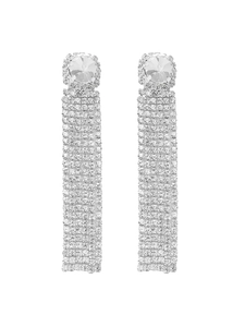 Detail of silver long tassel earrings with sparkling rhinestones and cubic zirconia