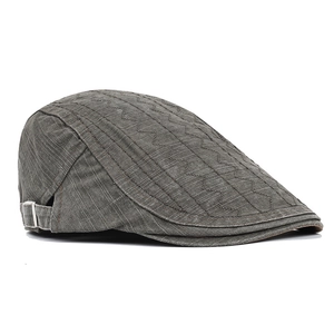 Men's retro brown cotton ivy cap with wavy stitching and side metal buckle detail