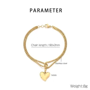 Detailed view of 14mm heart pendant on golden double-layer stainless steel chain