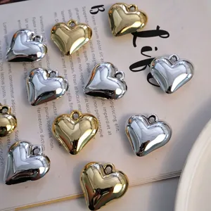 Polished laser acrylic heart pendants in gold and silver for DIY jewelry making