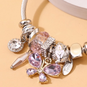 Stainless steel cable bracelet with purple crystal butterfly and pink beaded charms