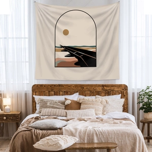 Close-up of bohemian wall tapestry with minimalist airplane window illustration on fabric