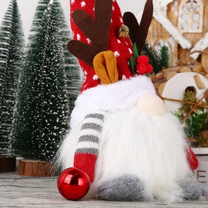 Lighted Christmas gnome doll with reindeer antlers and bells for festive decor