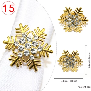 Macro detail of golden snowflake napkin ring with clear rhinestones and 4.8cm size