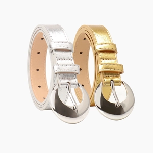 Women's trendy faux leather belt with large crescent silver buckle in gold and silver