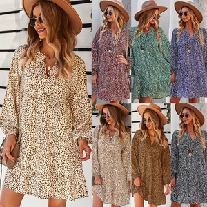 Collage of long sleeve V-neck leopard print dresses in multiple colors and ruffles