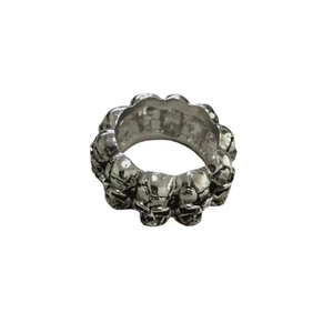 Vintage silver skull band ring for men featuring a gothic punk repeating skull design