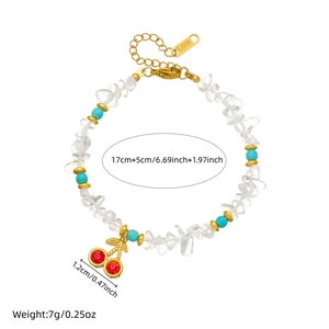 Irregular white turquoise and transparent bead bracelet with red rhinestone cherry pendant