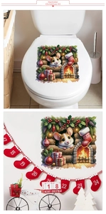Detailed view of festive hamster Christmas wall sticker on toilet lid and white wall