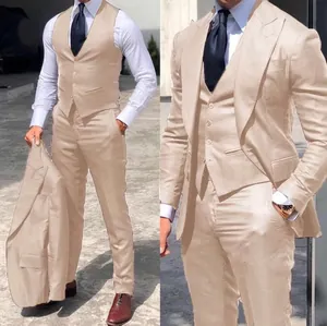 Detail of light beige three-piece business suit including blazer, vest, and trousers
