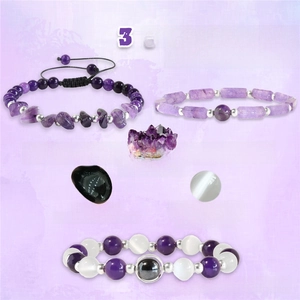 Detail of amethyst hematite and cat eye stone stretch bracelet set with metal beads