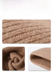 Close-up of thick ribbed knit fabric showing soft texture and detailed hem on beanie