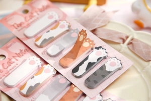 Detailed view of cat paw shaped multi-color index stickers with cute patterns