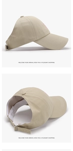 Detail of adjustable metal buckle and inner wash label on khaki bow baseball cap