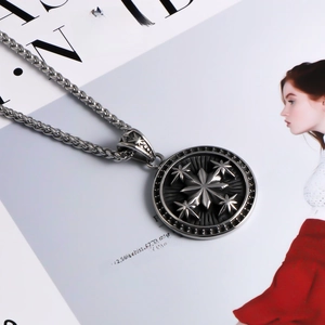 Detailed close-up of retro titanium steel necklace with star pendant on fashion magazine