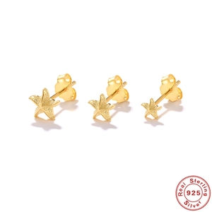 Three-piece set of gold S925 sterling silver starfish stud earrings on white background