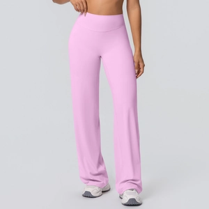 Close-up of high-waisted flared yoga pants in soft pink with breathable brushed fabric