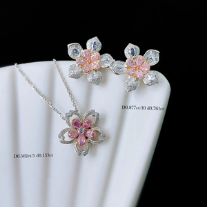Exquisite cherry blossom jewelry set with pink diamonds and silver necklace and earrings