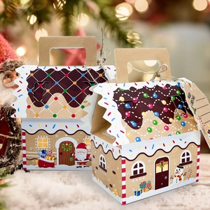 Close-up of a gingerbread house kraft paper gift box with festive Santa and snowman prints