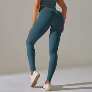 Detail view of high-waist seamless compression yoga pants with body-sculpting effect