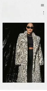 Detail of the high-quality leopard print texture and wide collar on faux fur winter coat