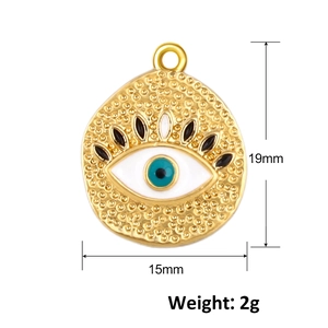 Close-up of gold Evil Eye pendant with 19mm height, 15mm width and 2g weight specs