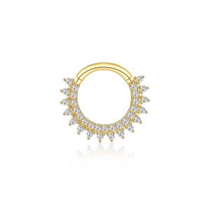 Macro shot of gold S925 sterling silver septum ring with sparkling sunburst zircon detail