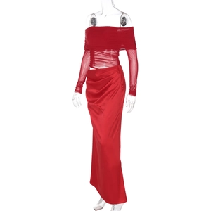 Detail of red off-shoulder mesh top and high waist satin maxi skirt two-piece set