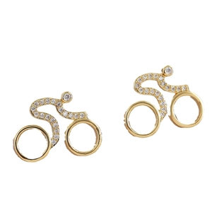 Unique gold bicycle stud earrings with sparkling pavé cubic zirconia for women