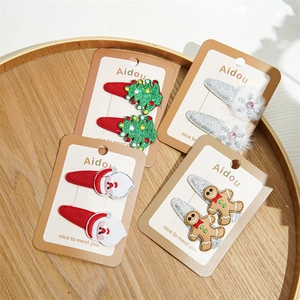 Cute 8-piece Christmas hair clip set with reindeer, snowflakes, and festive patterns