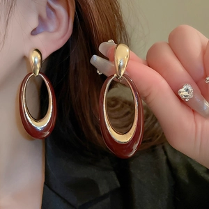 Retro oversized oval earrings with gold metal stud and burgundy resin drop charm