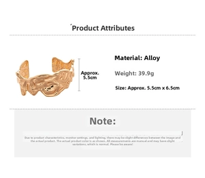 Detail view of irregular gold cuff bracelet showing 5.5cm x 6.5cm dimensions and texture