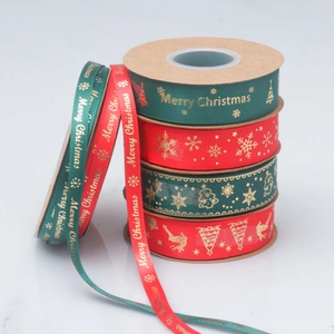 Christmas ribbon rolls with gold Merry Christmas print in red and green for tree gift decor