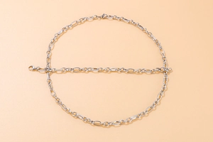 Macro detail of silver stainless steel chain with unique infinity link structure