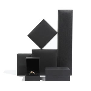 Minimalist black textured jewelry gift box collection for rings and necklaces